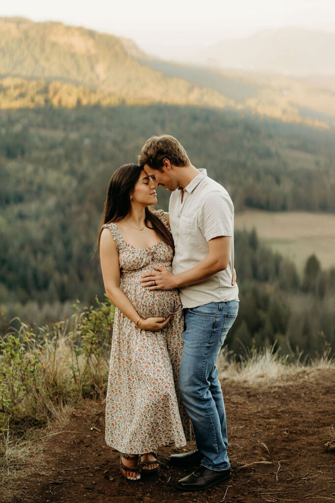 couple maternity photos embracing outdoors columbia river gorge vancouver wa